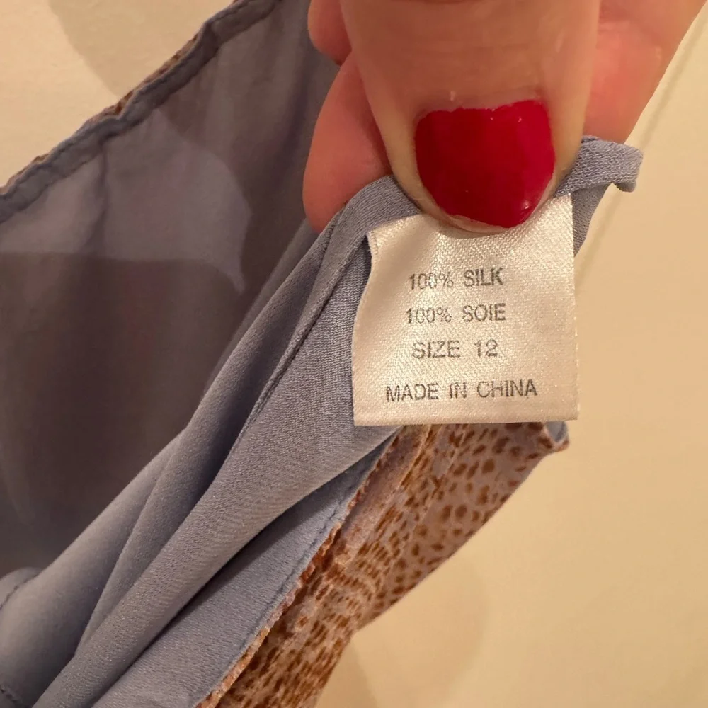 Tahari slip spaghetti strap 100% silk dress. Size 12.
NEWLY dry cleaned. - Picture 12 of 13